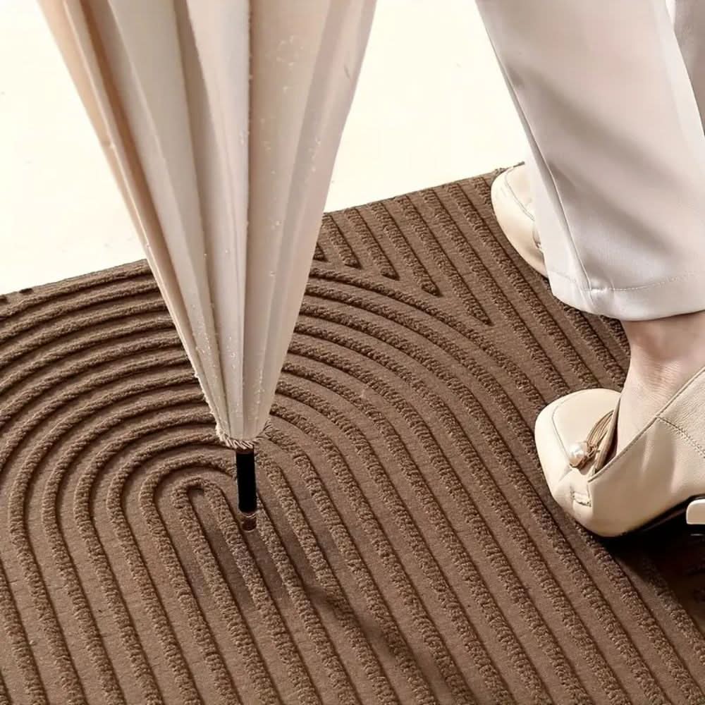 AQUARAY – Absorbent, washable mat with flowing line pattern